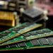 Detailed view of RAM sticks and microprocessors on a motherboard.