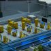 Detailed industrial model display showcasing machinery and systems indoors, emphasizing technology and design.