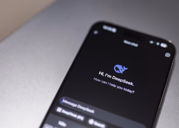 Close-up of smartphone screen showing DeepSeek AI chatbot interface on a modern device.