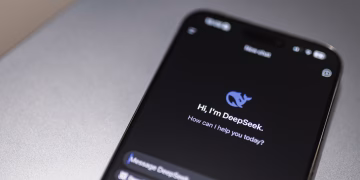Close-up of smartphone screen showing DeepSeek AI chatbot interface on a modern device.