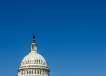 Stunning view of the US Capitol Dome in Washington, DC, with clear blue sky.