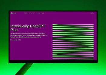 Close-up of a monitor displaying ChatGPT Plus introduction on a green background.