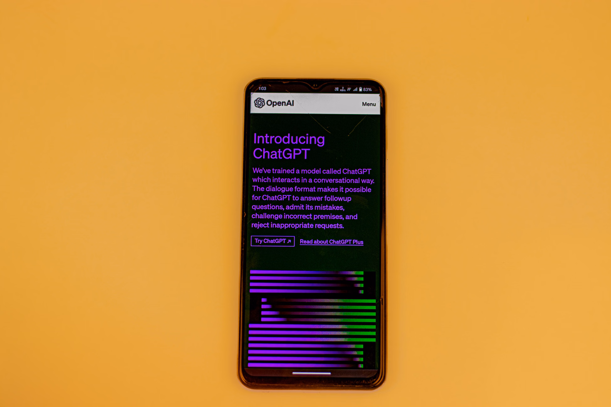 Smartphone displaying ChatGPT interface on a vibrant background, showcasing AI technology.