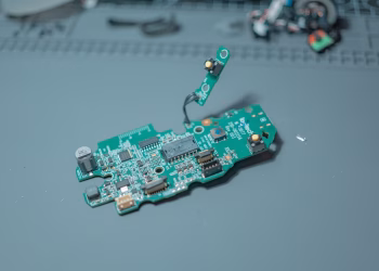 Detailed close-up of a circuit board showcasing intricate electronic components and wiring.