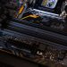 Detailed view of a computer motherboard showcasing RAM slots and electronic components.