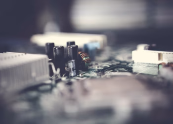 Detailed view of electronic circuit components with a soft focus effect.