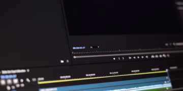 Close-up of a video editing software interface showing timeline and controls.