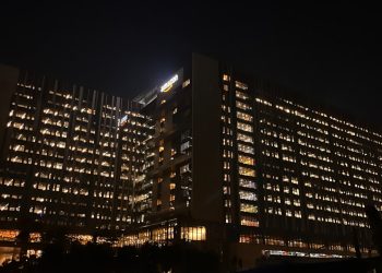Modern office building illuminated at night