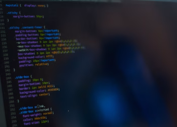 Close-up of CSS code displayed on a computer monitor, showcasing web development.