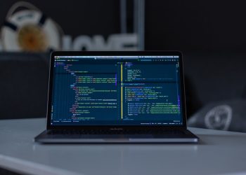turned-on grey laptop computer