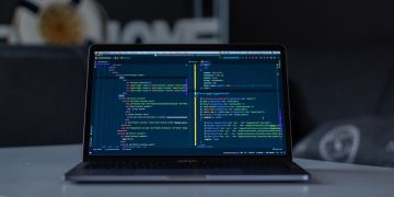 turned-on grey laptop computer