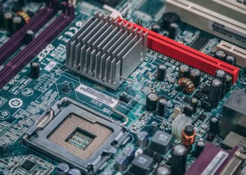 Detailed image of a modern computer motherboard showcasing components and circuits.