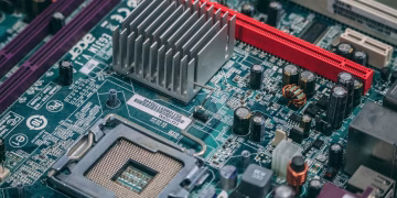 Detailed image of a modern computer motherboard showcasing components and circuits.
