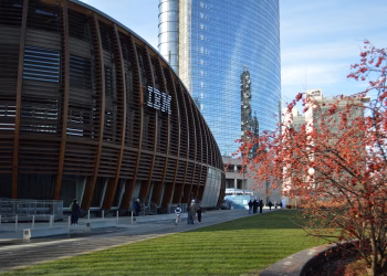 Contemporary architecture in Milan with skyscrapers and natural elements.