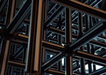 Intricate steel lattice structure showcasing modern geometric industrial design.