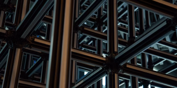 Intricate steel lattice structure showcasing modern geometric industrial design.