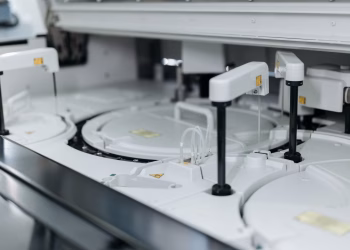 Close-up of advanced laboratory machinery in a medical facility, showcasing precise scientific equipment.