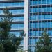 corporate sustainability office green building glass facade