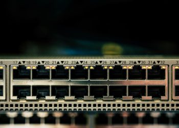 Detailed view of a network switch featuring multiple ethernet ports and LED indicators.