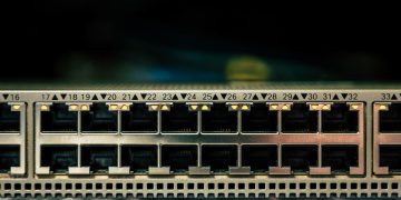 Detailed view of a network switch featuring multiple ethernet ports and LED indicators.