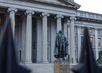 Statue of Albert Gallatin in front of the US Treasury Department building in Washington, DC.