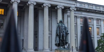 Statue of Albert Gallatin in front of the US Treasury Department building in Washington, DC.