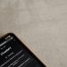 A smartphone displays the ChatGPT interface on its screen, symbolizing modern AI technology.