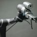 Close-up view of a robotic arm equipped with a video camera, showcasing modern technology.