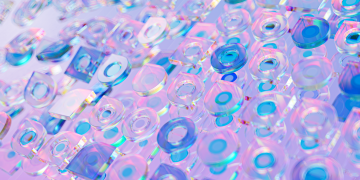 Vibrant abstract 3D render featuring transparent glass shapes with a holographic effect.