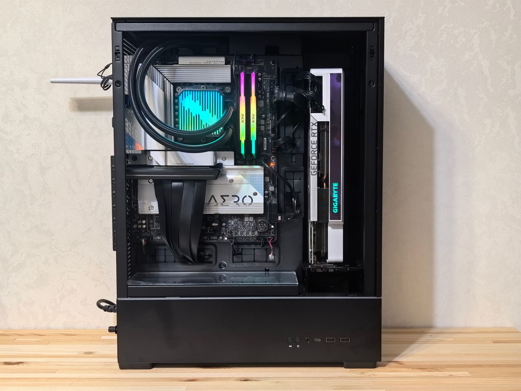 An ultra-modern gaming PC build showcasing RGB lighting and advanced components.