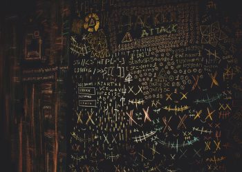 Chalkboard filled with complex cybersecurity and hacking symbols in colorful chalk.