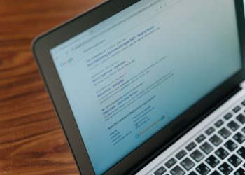 A close-up view of a laptop displaying a search engine page.