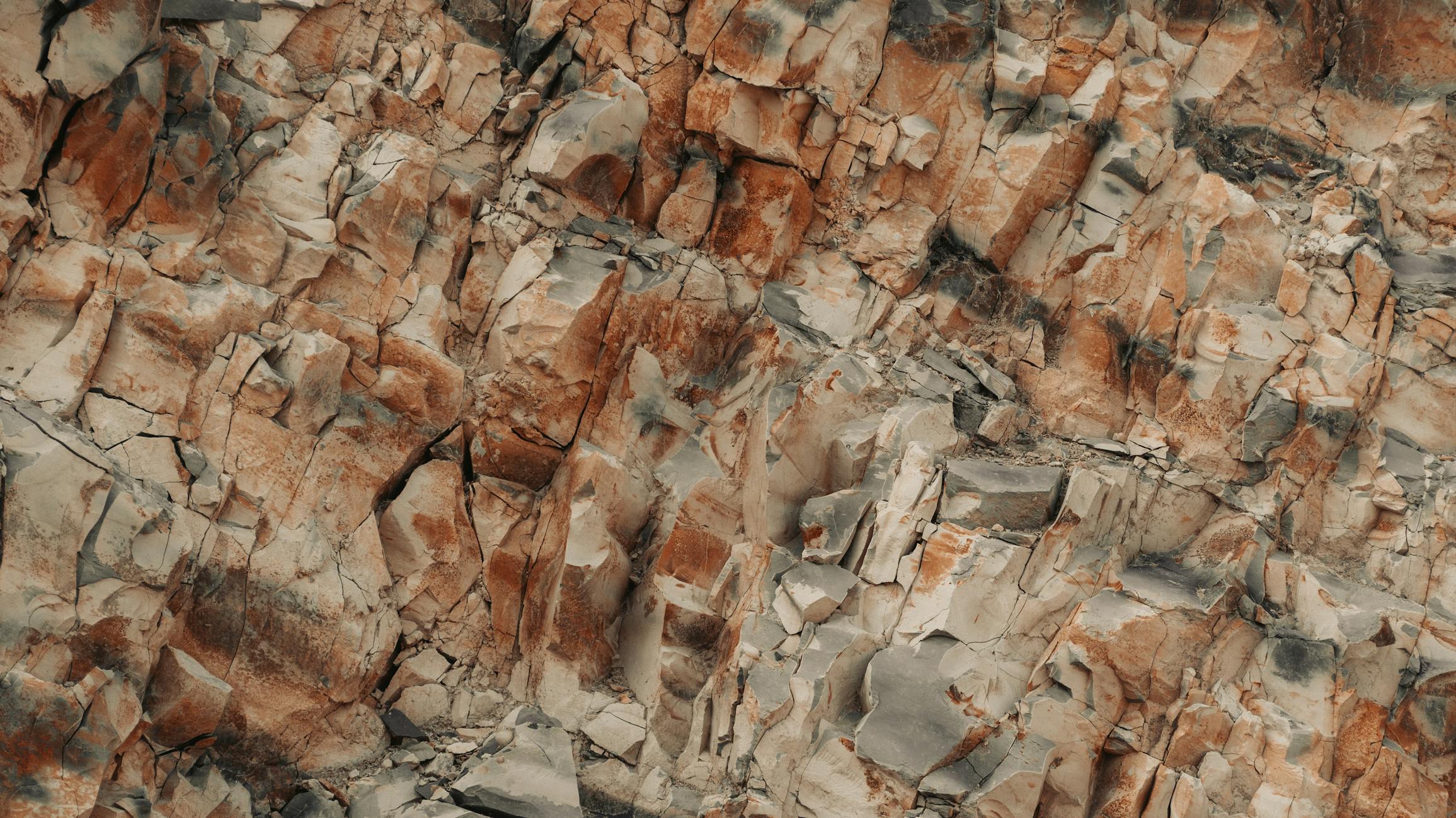 Close-up view of an eroded rock formation showcasing intricate textures and patterns.