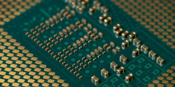 Detailed close-up of a microprocessor circuit board showcasing intricate circuitry and components.