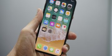 person holding space gray iPhone 7