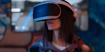Young woman exploring virtual reality with VR headset indoors, surrounded by colorful lights.