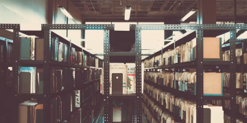 Bookshelves in a library with a vintage tone in San José, Costa Rica.