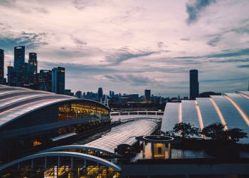 Scenic Singapore city skyline at dusk featuring modern skyscrapers and urban architecture.