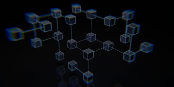 a group of cubes that are on a black surface