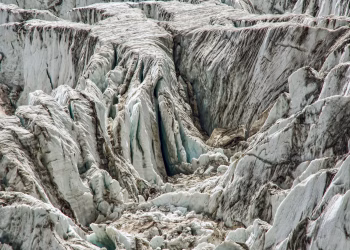 A detailed view of rugged ice crevasses and glacial formations showcasing nature's winter beauty.