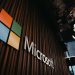 Interior view of Microsoft office with logo on wooden wall in Brussels, Belgium.