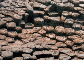 Close-up view of hexagonal basalt columns showcasing natural geometric patterns.