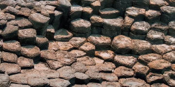 Close-up view of hexagonal basalt columns showcasing natural geometric patterns.