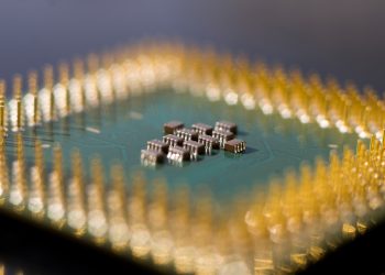 a close up of a circuit board with many small pieces of electronic equipment