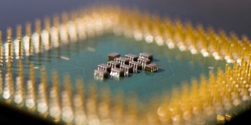a close up of a circuit board with many small pieces of electronic equipment