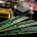 Detailed view of RAM sticks and microprocessors on a motherboard.