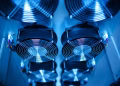 Close-up of cooling fans in a server room, showcasing technology and efficiency.