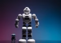 Close-up shot of two white robots displayed on a colorful gradient background symbolizing innovation in robotics.