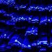 Rows of metal bars illuminated with blue light