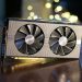 Close-up of a high-performance graphics card with decorative LED lights in the background.